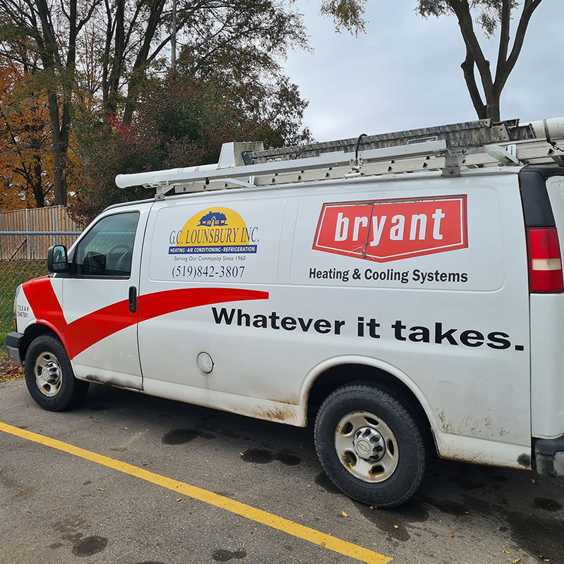 G.C. Lounsbury's heating & air conditioning specialists service truck in a parking lot